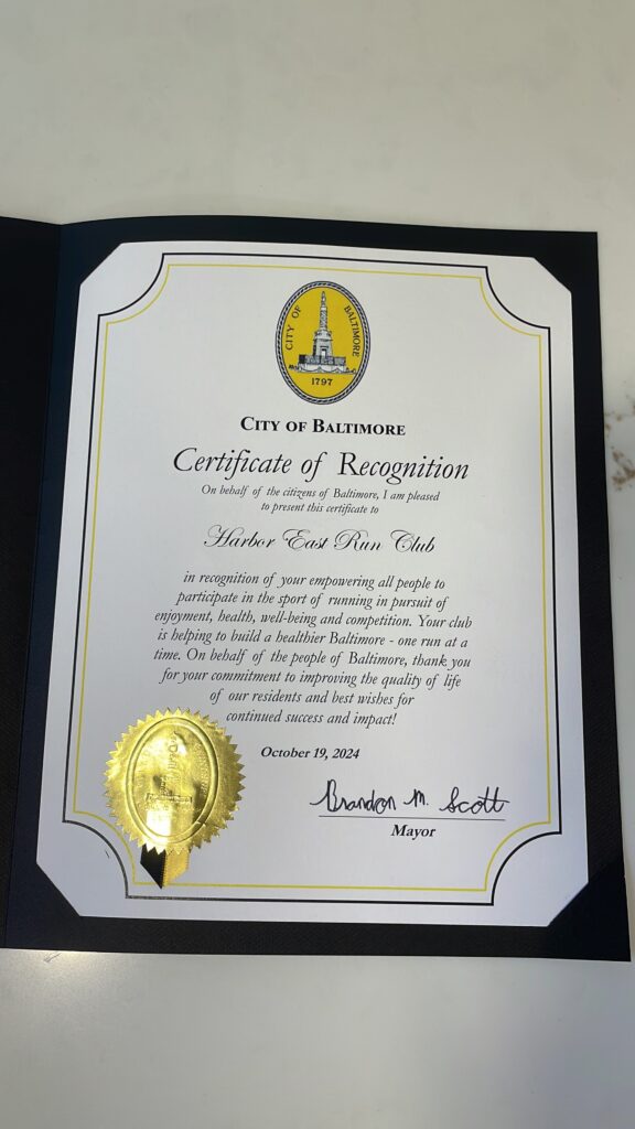 Harbor East Run Club Honored by Mayor Brandon Scott for Positive Community Impact